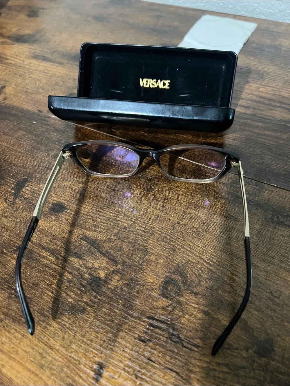 Versace Black Frame Sunglasses with Gold Temples